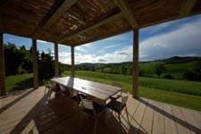 the wooden table of the pergola